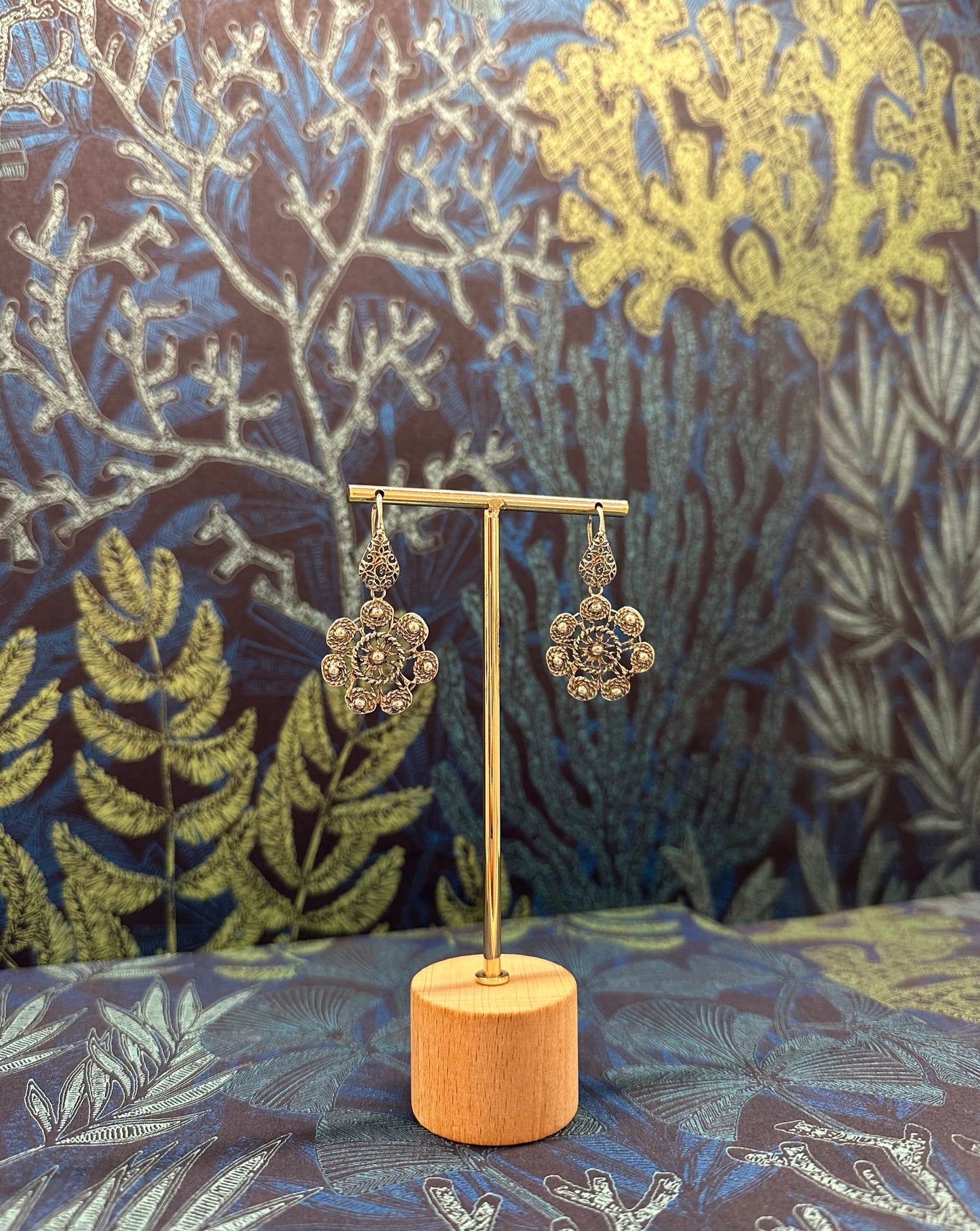 Pendientes flor plana plata